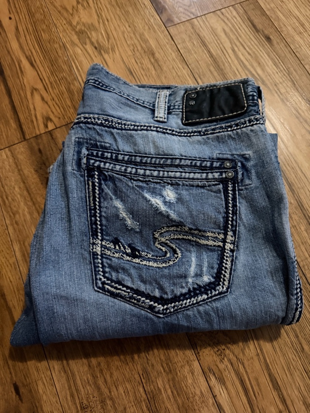 Silver Jeans Light Blue Distressed Boot Cut with Embroidered Back Pocket